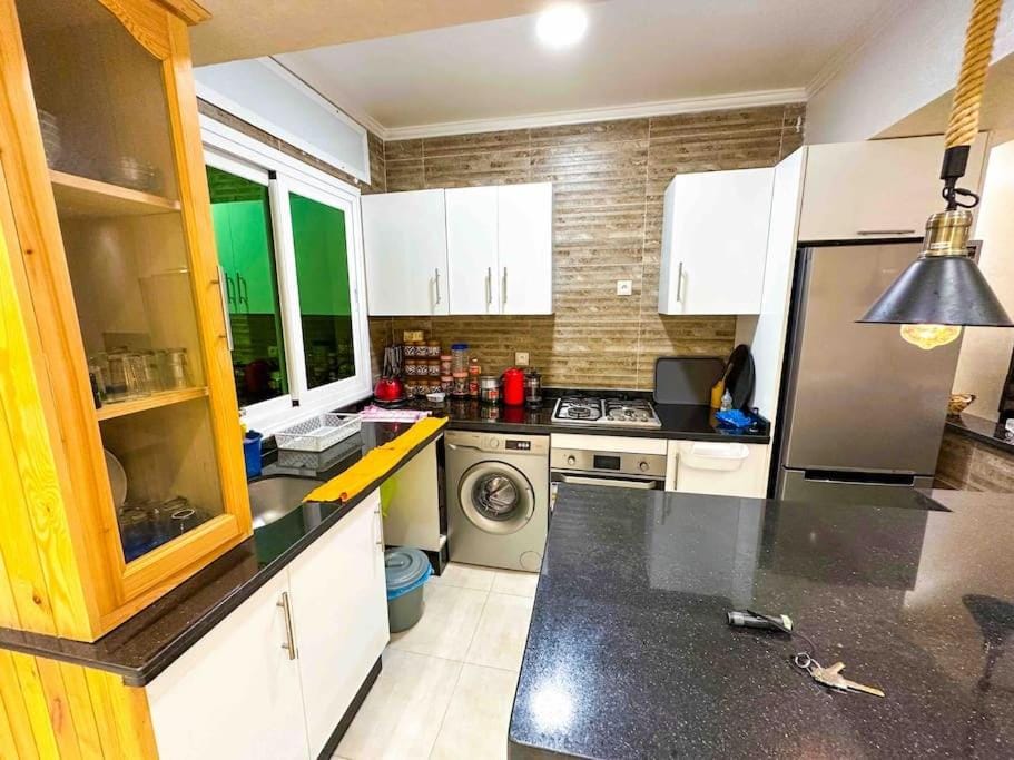 Kitchen or kitchenette, oven, stove, toaster