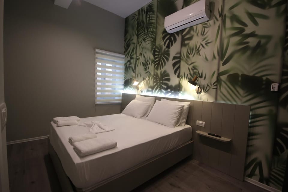 Bed, Photo of the whole room, Bedroom, towels, air conditioner