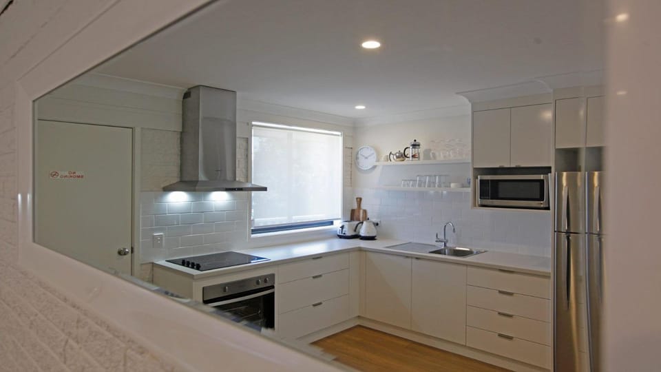 Kitchen or kitchenette, oven, stove