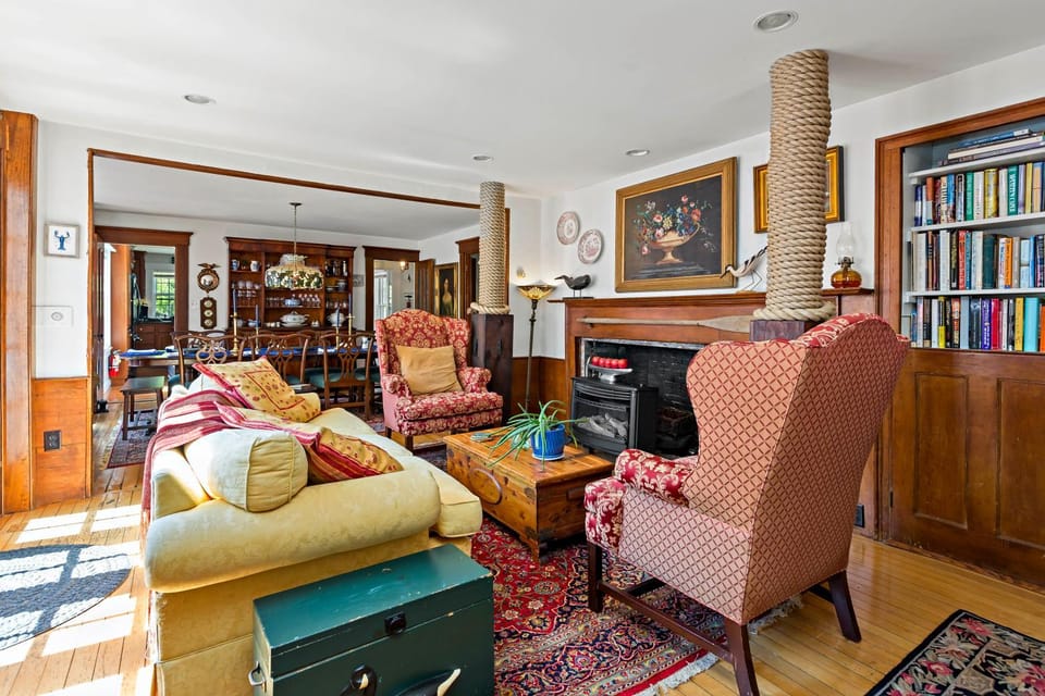 Library, Living room, Seating area, Dining area, fireplace