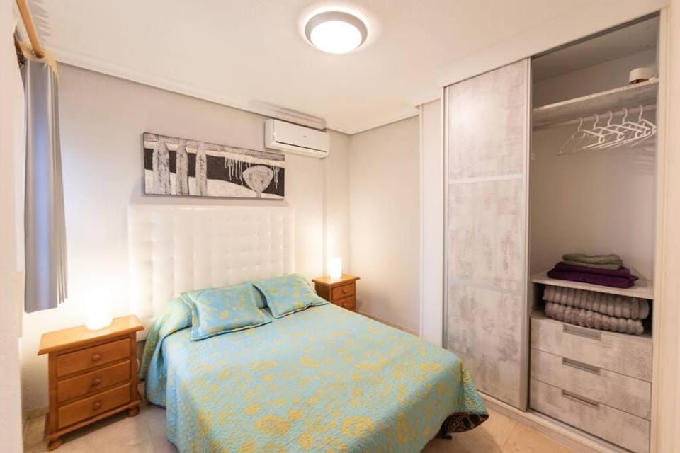 Bed, Bedroom, towels, wardrobe, air conditioner