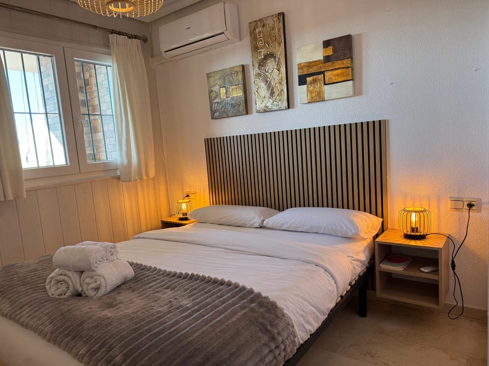 Bed, Photo of the whole room, Bedroom, towels, air conditioner
