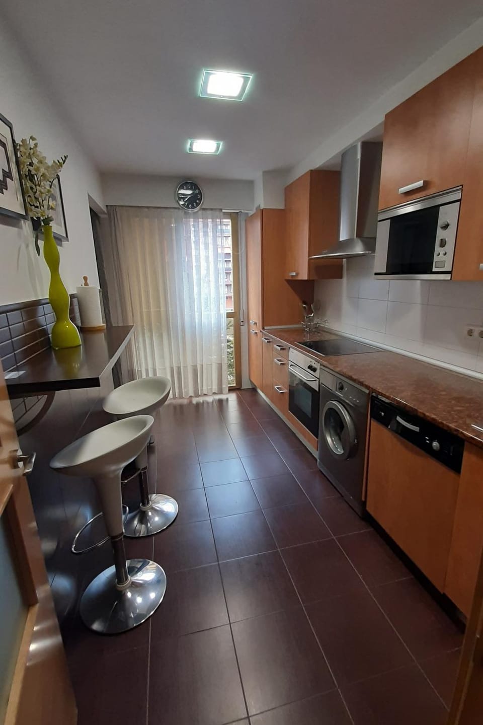 Kitchen or kitchenette, dishwasher, oven, stove, toaster
