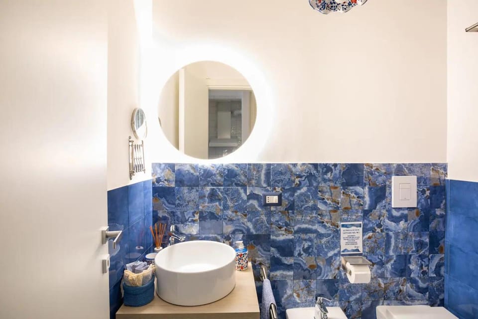 Bathroom, bidet, towels