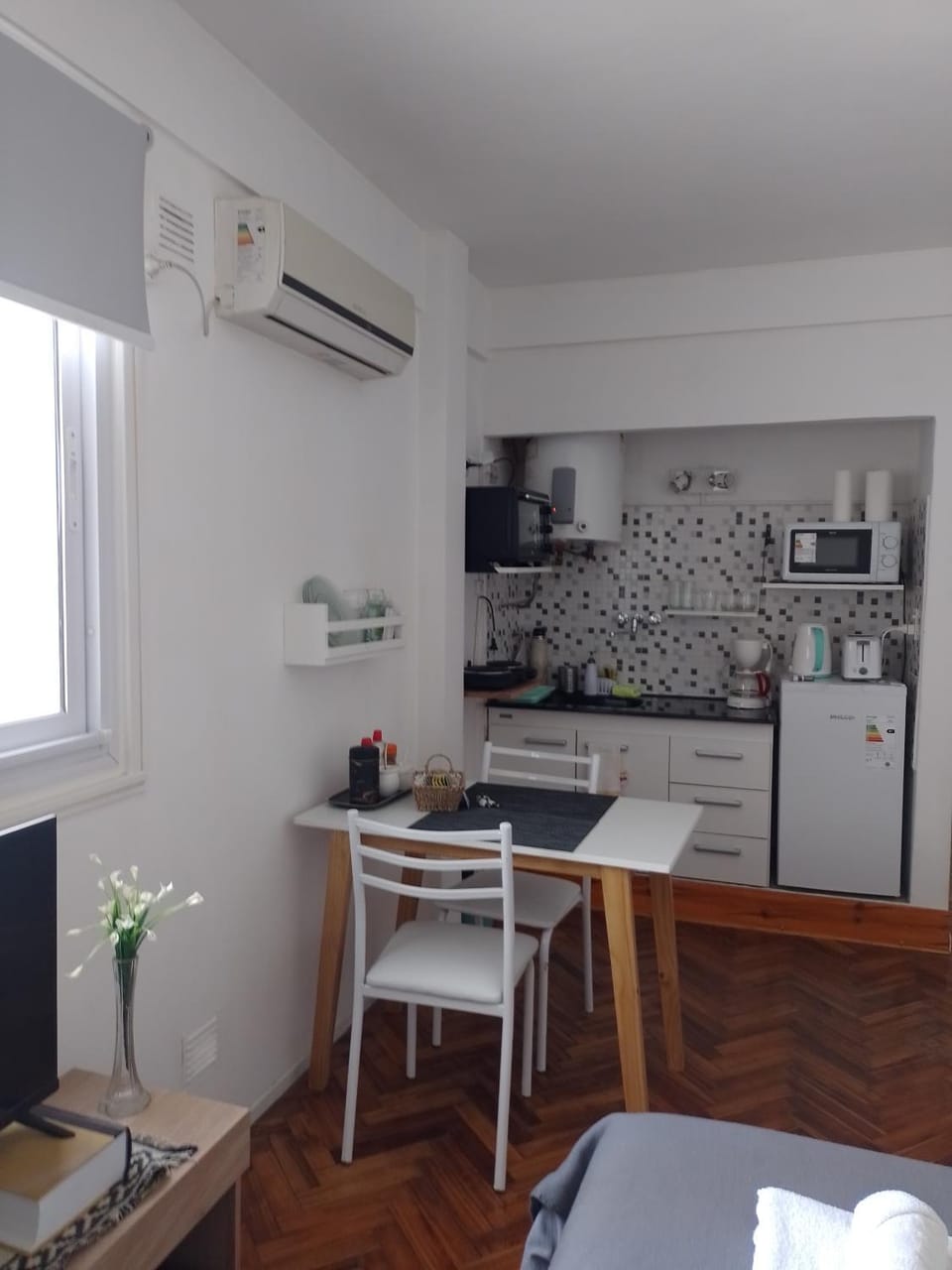 Kitchen or kitchenette, oven, stove, air conditioner
