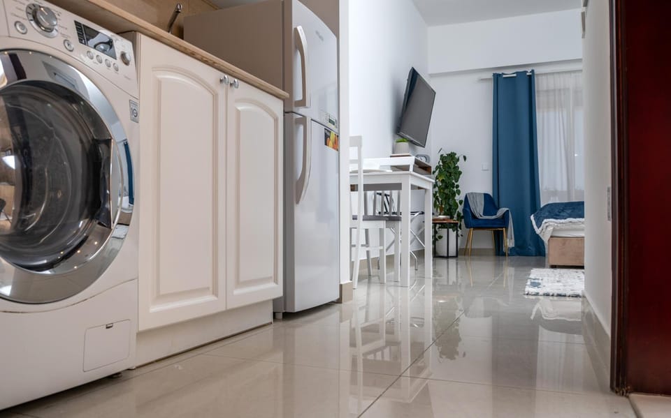 Kitchen or kitchenette, washing machine
