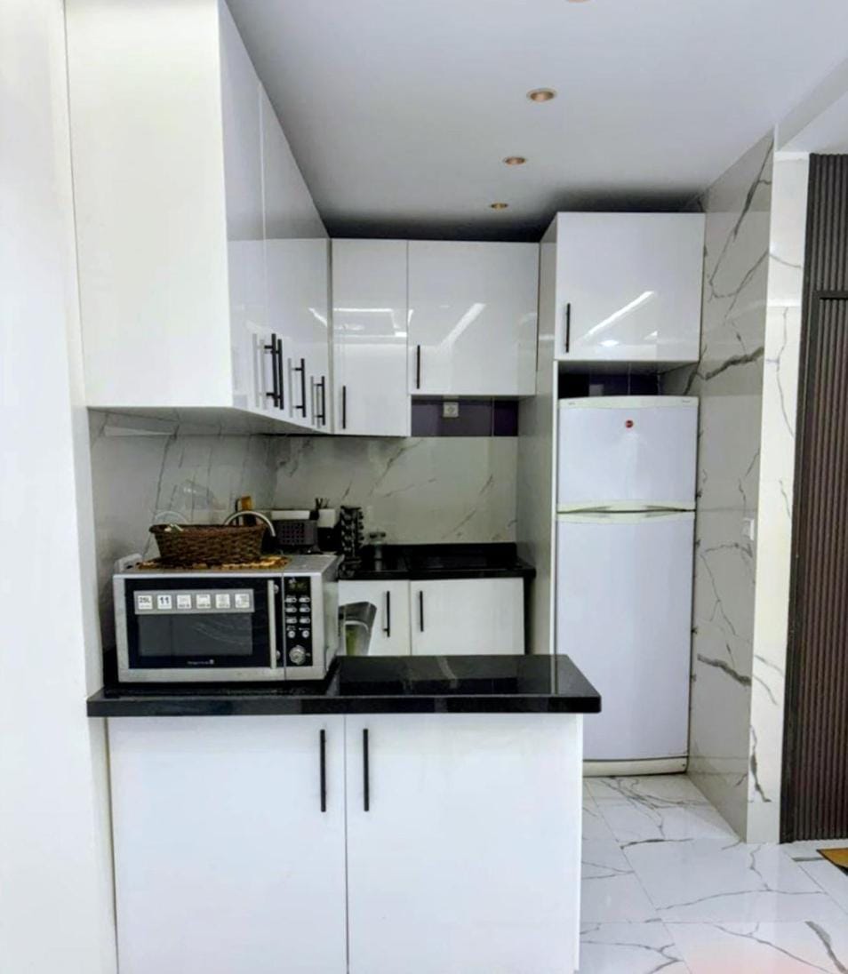 Kitchen or kitchenette, stove