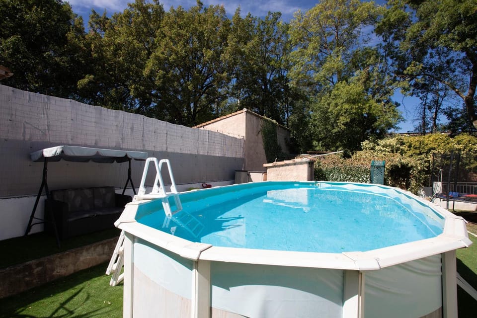 Property building, Living room, Swimming pool