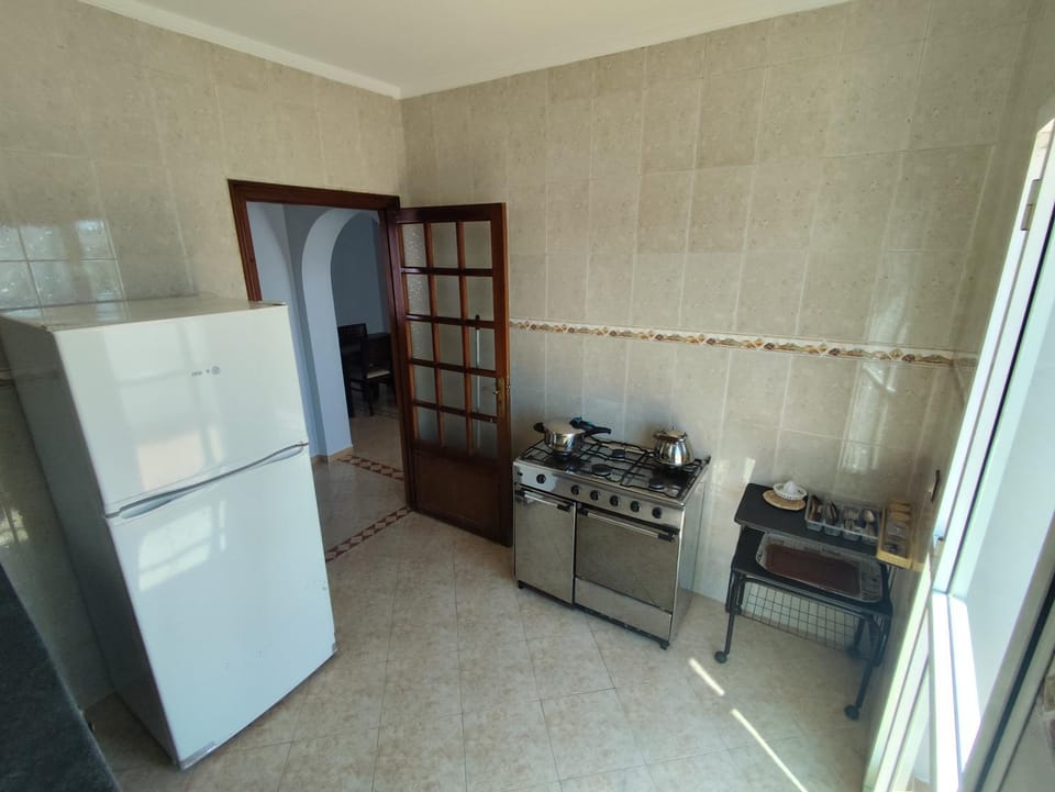 Kitchen or kitchenette, oven, stove
