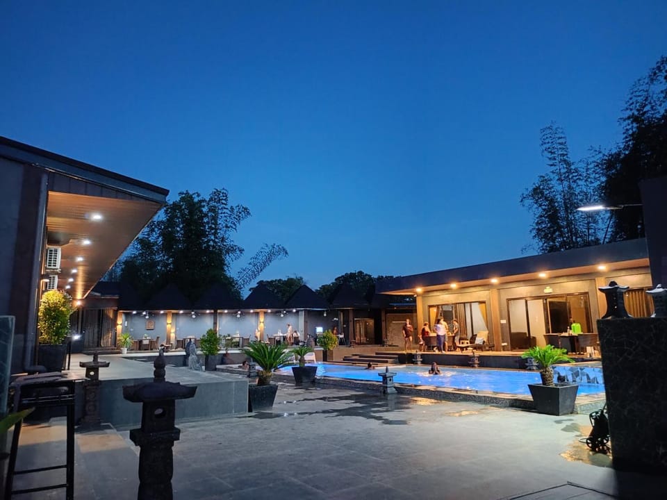 Property building, Patio, Night, Garden, Garden view, Pool view, Swimming pool