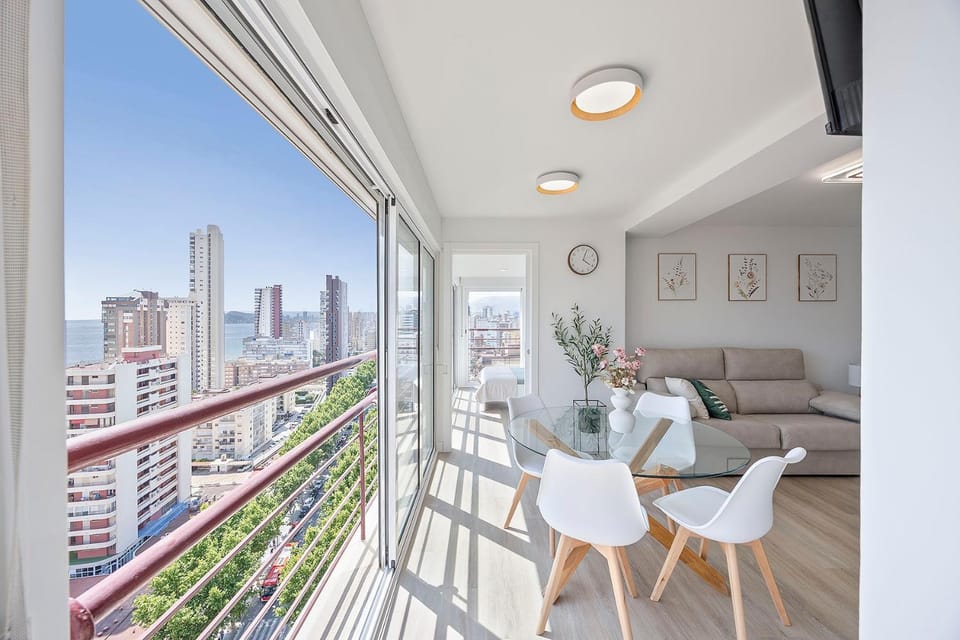 View (from property/room), Living room, Seating area, Dining area, City view