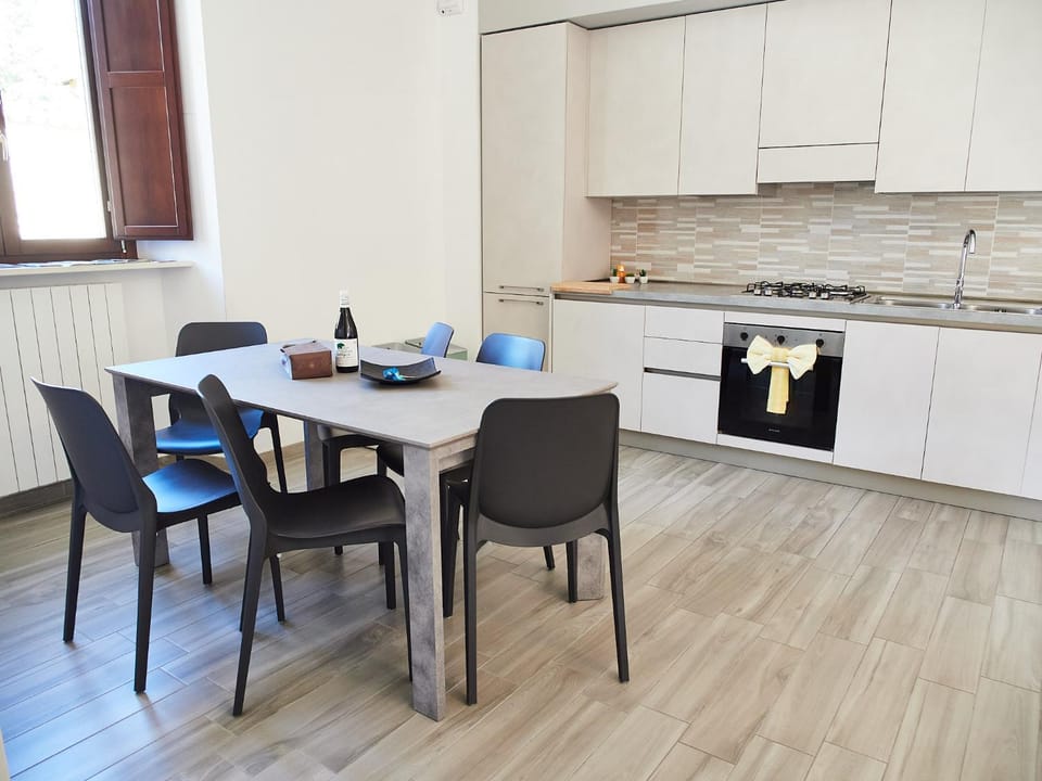 Kitchen or kitchenette, Seating area, Dining area, dishwasher, microwave, oven, stove, washing machine