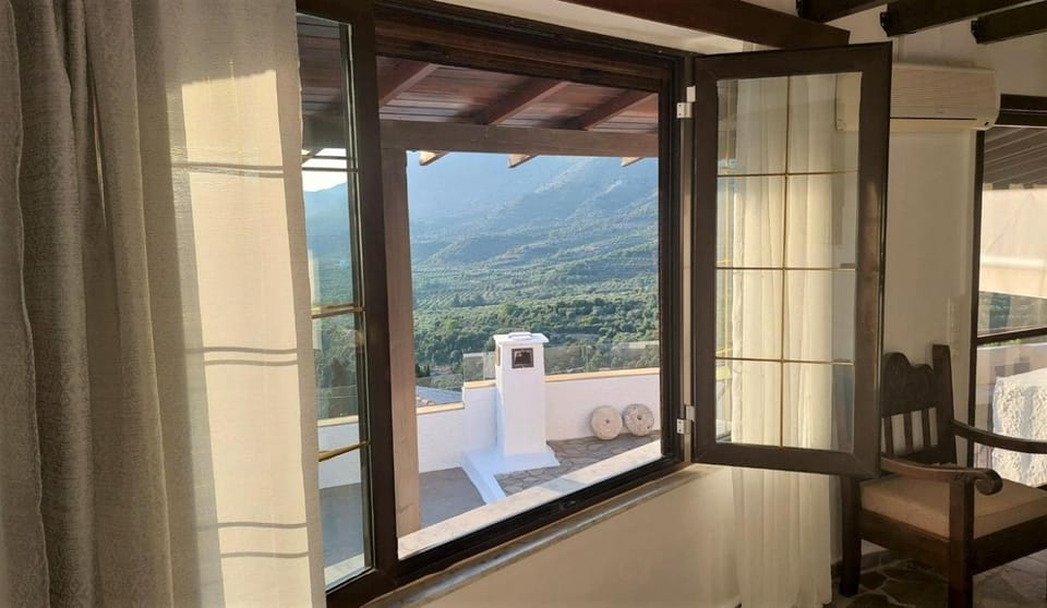 Natural landscape, View (from property/room), Living room, Seating area, Mountain view