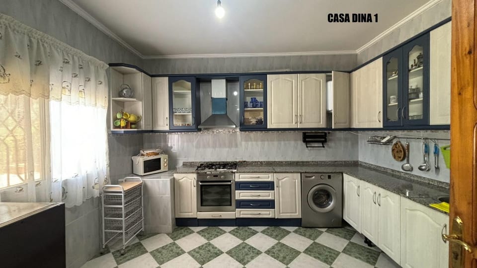 Kitchen or kitchenette, washing machine