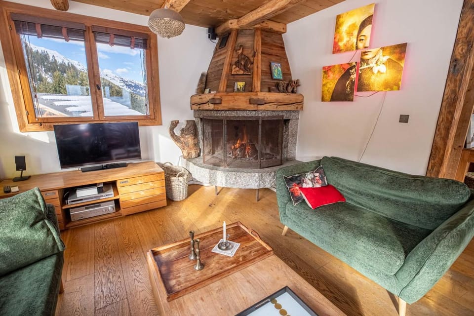 Chalet le Cairn - unique ski-in ski-out location! Outside Hot tube Chalet in Les Allues