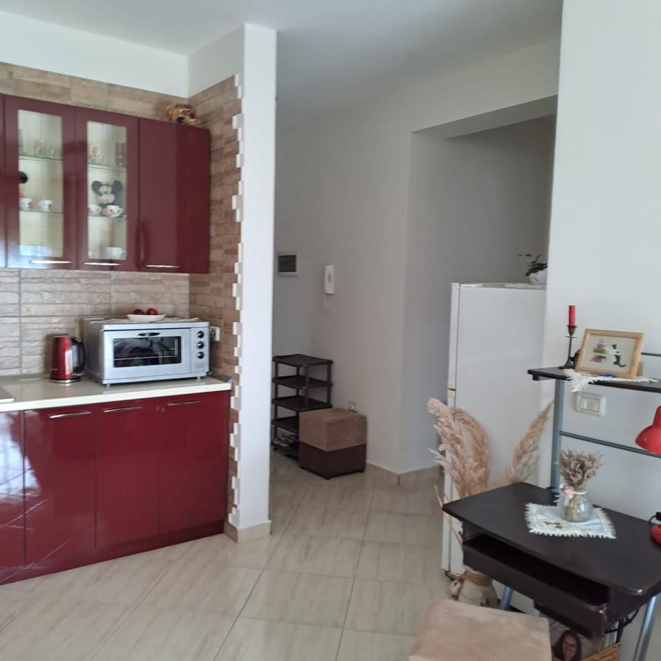 Coffee/tea facilities, Kitchen or kitchenette, Living room, Seating area, Dining area, oven, toaster