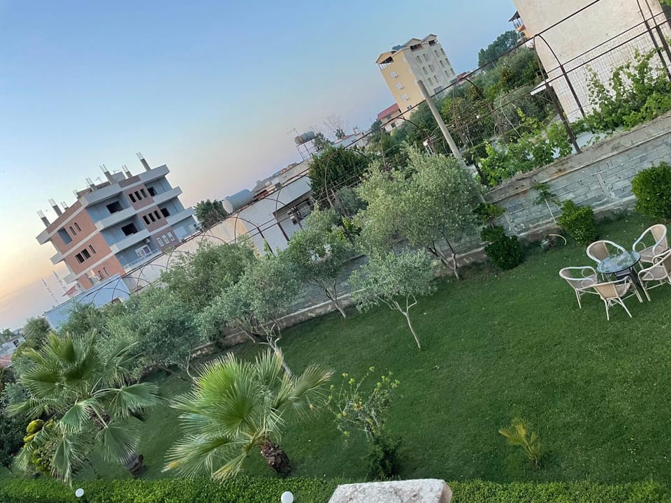 Property building, Day, Natural landscape, Garden, Seating area, Garden view, Sunset, Parking