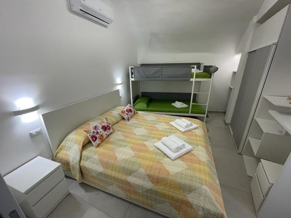 Bed, Photo of the whole room, Bedroom, towels, air conditioner