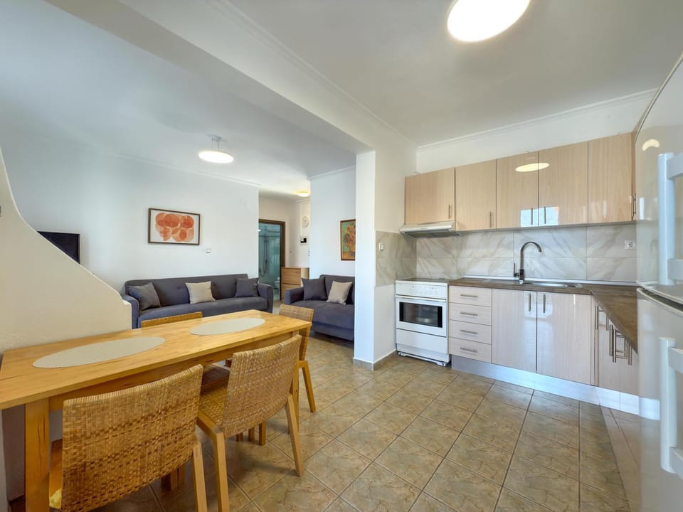 Kitchen or kitchenette, Living room, Seating area, Dining area, oven, stove, toaster