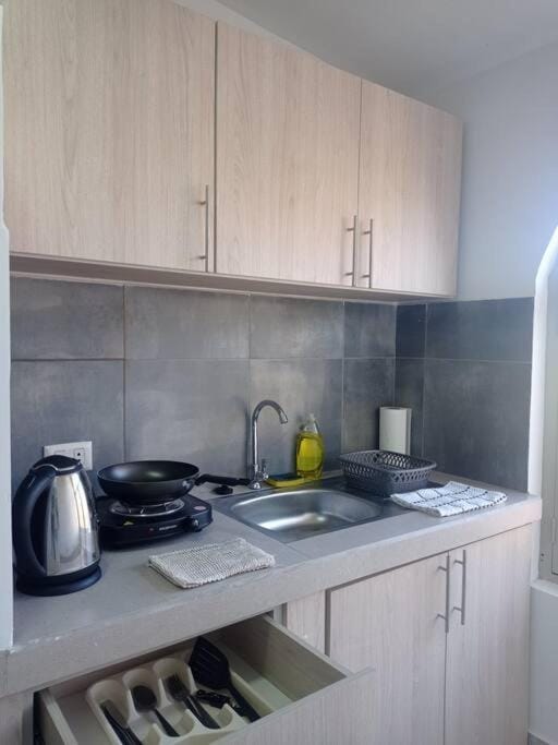 Kitchen or kitchenette, stove
