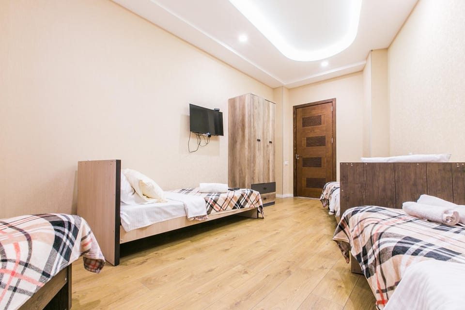 Bed, TV and multimedia, Bedroom, towels, wardrobe