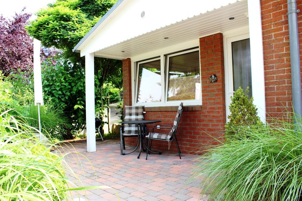 Facade/entrance, BBQ facilities, Balcony/Terrace, Beach