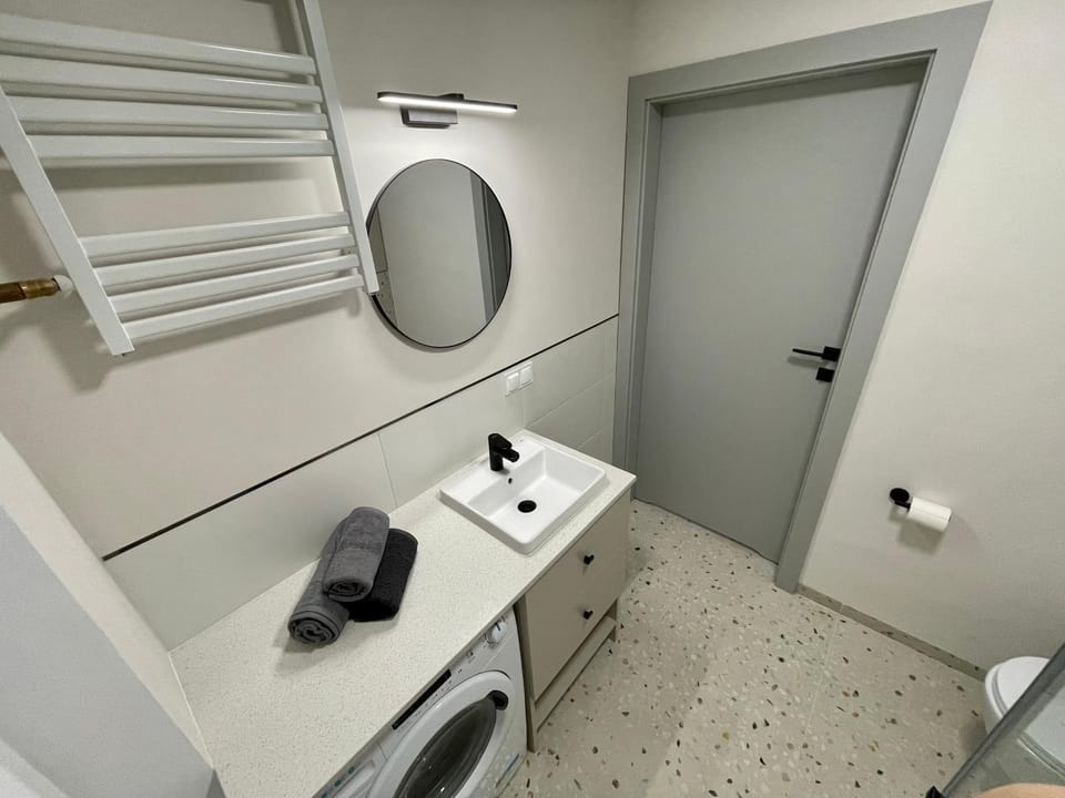 Bathroom, washing machine, dryer