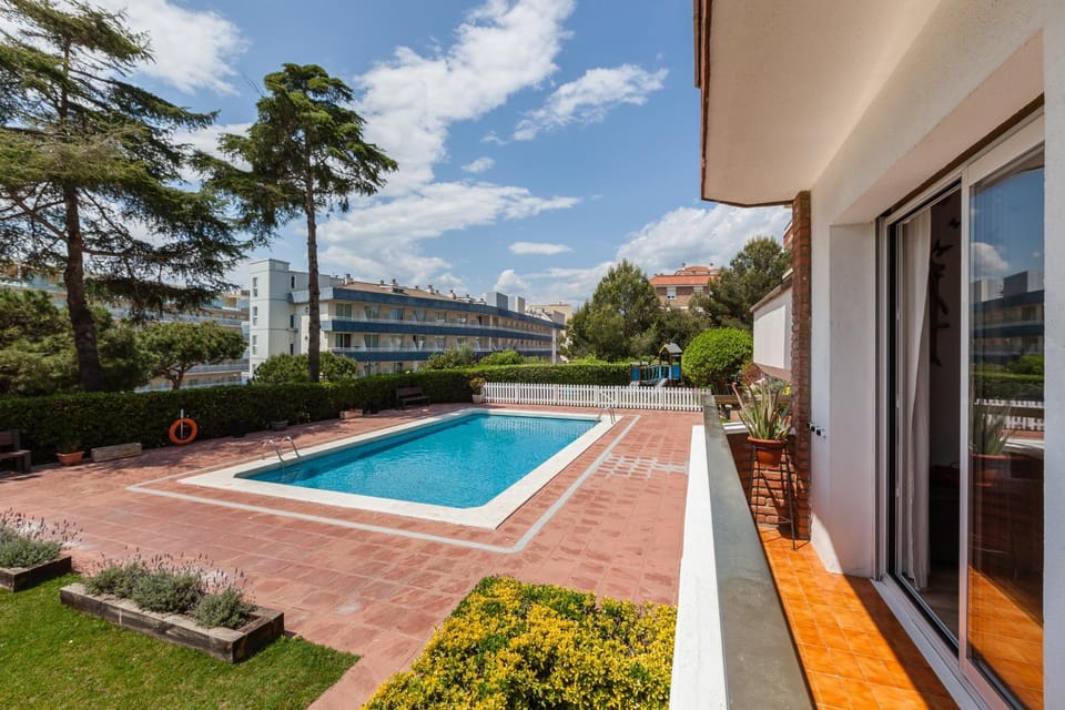 Property building, Living room, Swimming pool