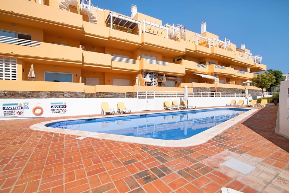 Property building, Living room, Swimming pool