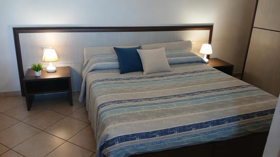 Domo - Guest-House Il Nespolo Fiorito Bed and Breakfast in Orosei