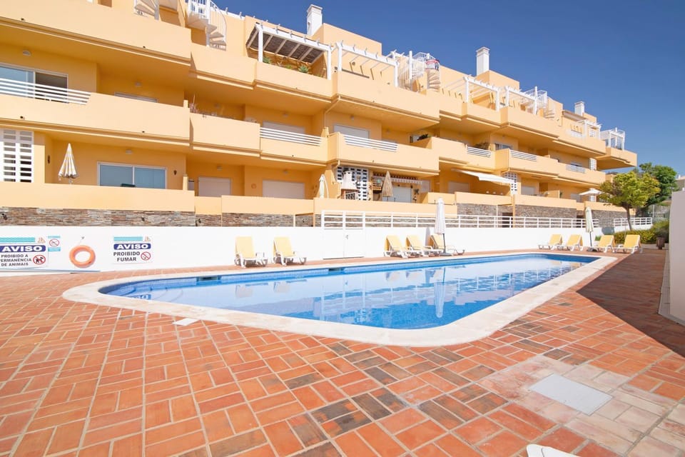 Property building, Living room, Swimming pool