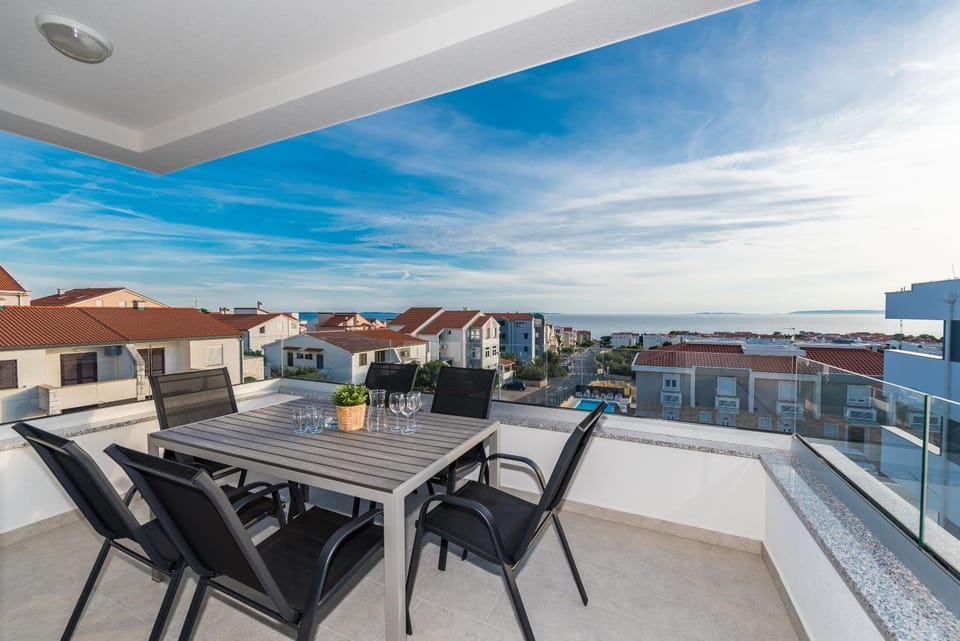 Property building, Patio, Day, View (from property/room), Balcony/Terrace, Balcony/Terrace, Seating area, Sea view