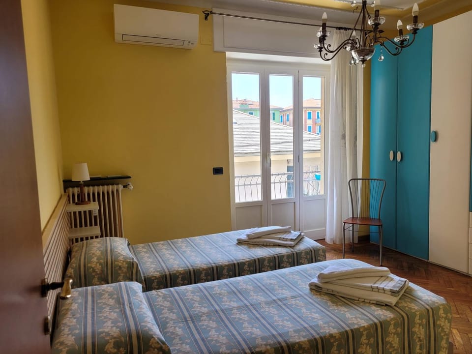 Bed, Photo of the whole room, Bedroom, towels, air conditioner