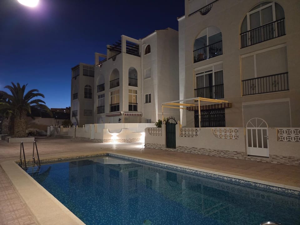 Property building, Facade/entrance, Night, Neighbourhood, Summer, View (from property/room), Pool view, Swimming pool, Inner courtyard view