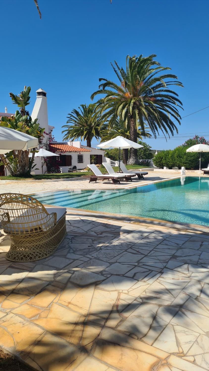 Swimming pool, sunbed