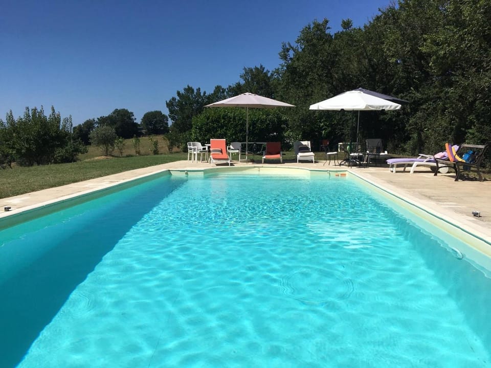 Property building, Living room, Swimming pool
