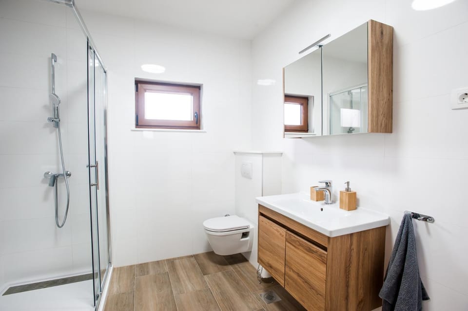 Shower, Toilet, Bathroom, hair dryier, towels