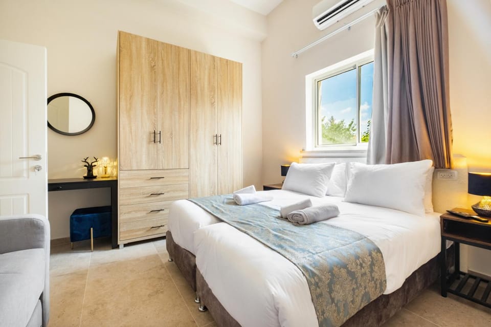Bed, Bedroom, towels, wardrobe, air conditioner