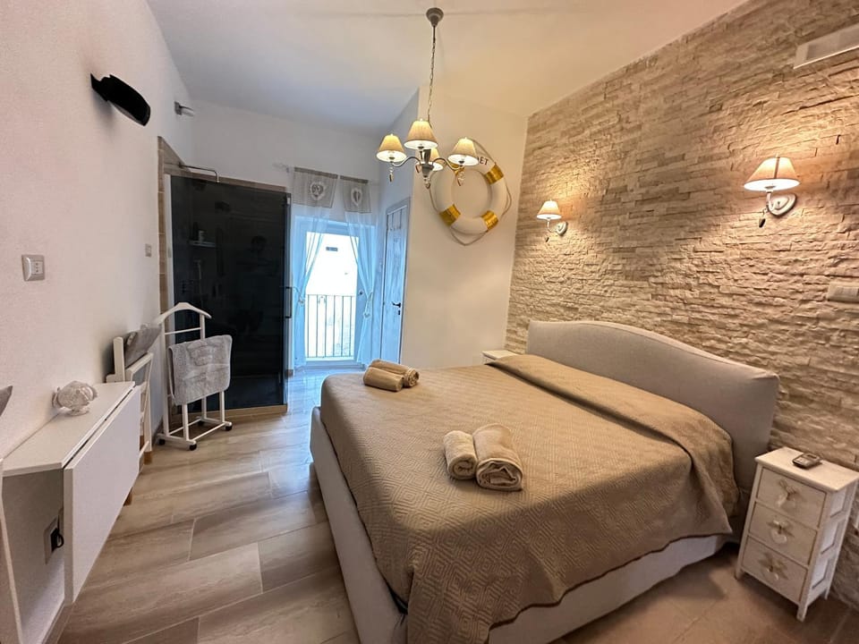 Cozy Sea View Flat with Private 83 sq Rooftop, Balcony, and BBQ in the Old Town Apartment in Vieste