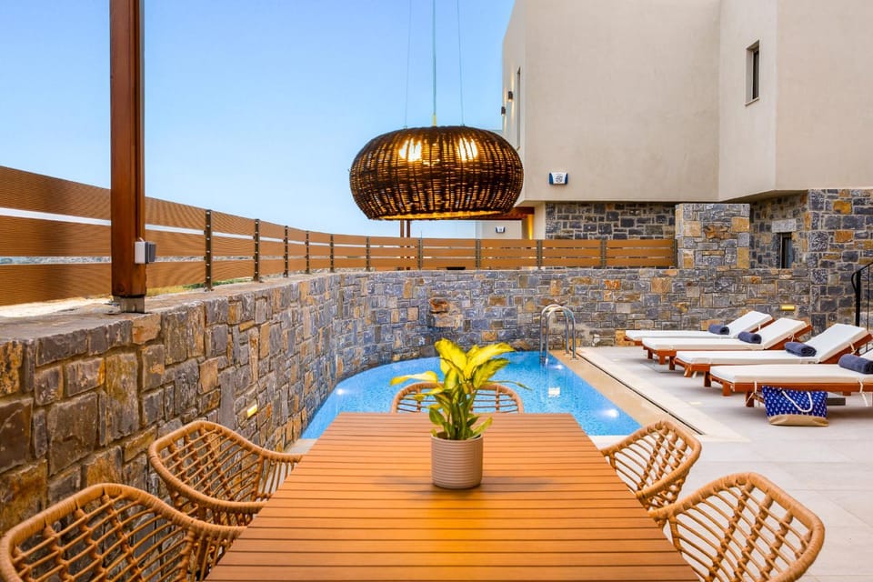 Patio, Day, Seating area, Pool view, Swimming pool, sunbed