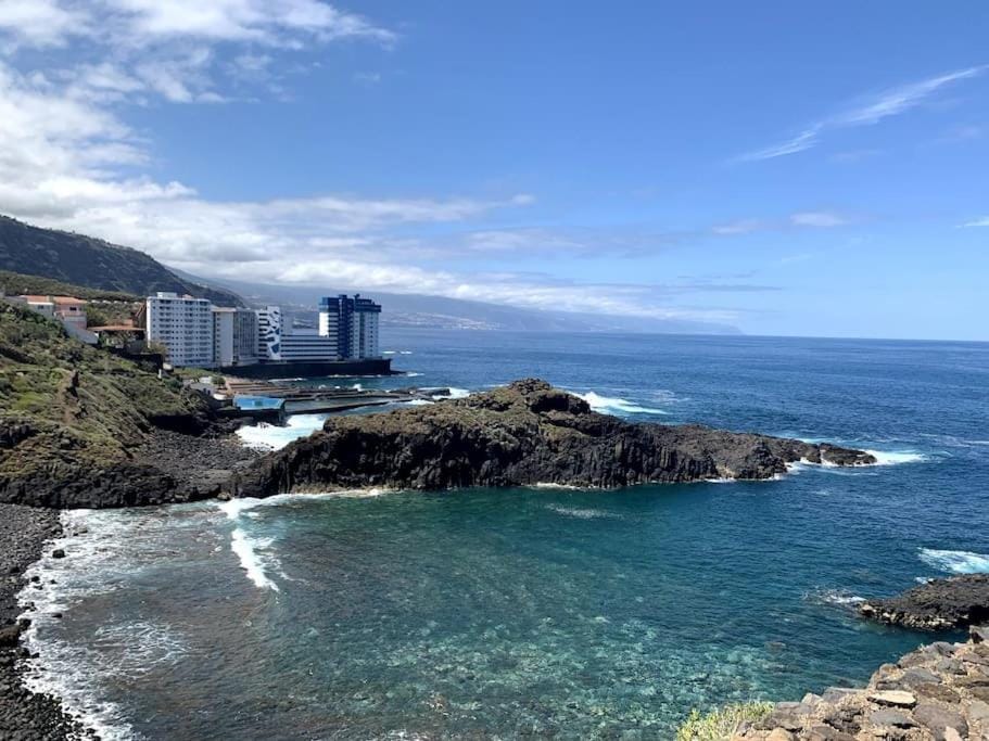 Nearby landmark, Natural landscape, Beach, Mountain view