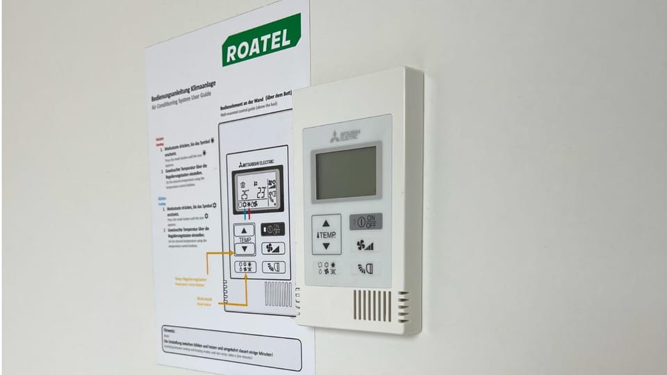 Photo of the whole room, air conditioner
