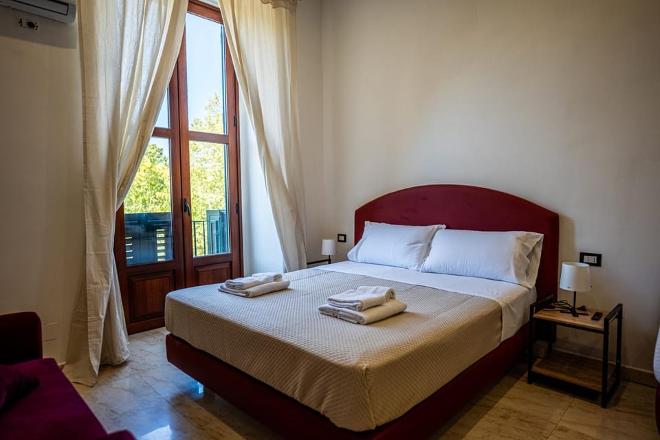 Bed, Photo of the whole room, Bedroom, City view, towels, air conditioner
