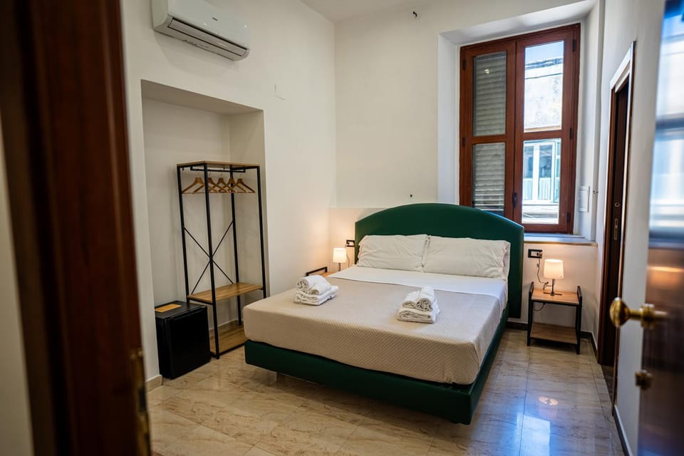 Bed, Photo of the whole room, Bedroom, towels, air conditioner