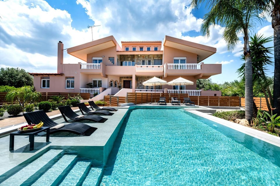 Property building, Patio, Day, Garden, Living room, Seating area, Garden view, Pool view, Swimming pool, sunbed
