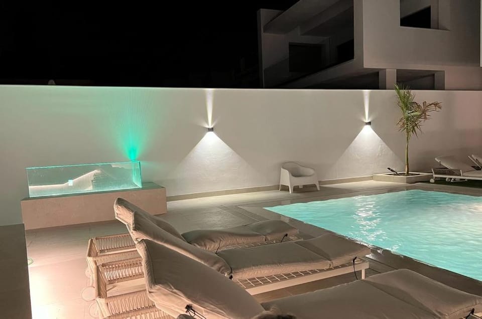 Night, Pool view, Swimming pool, sunbed