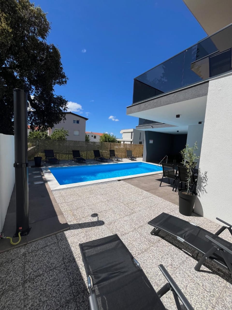 Shower, Swimming pool, sunbed