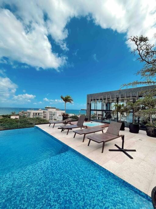 View (from property/room), Pool view, Sea view, Swimming pool, sunbed