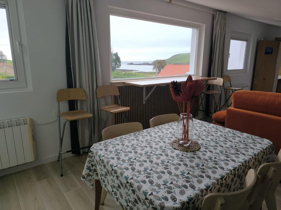 Natural landscape, Living room, Seating area, Dining area, Sea view