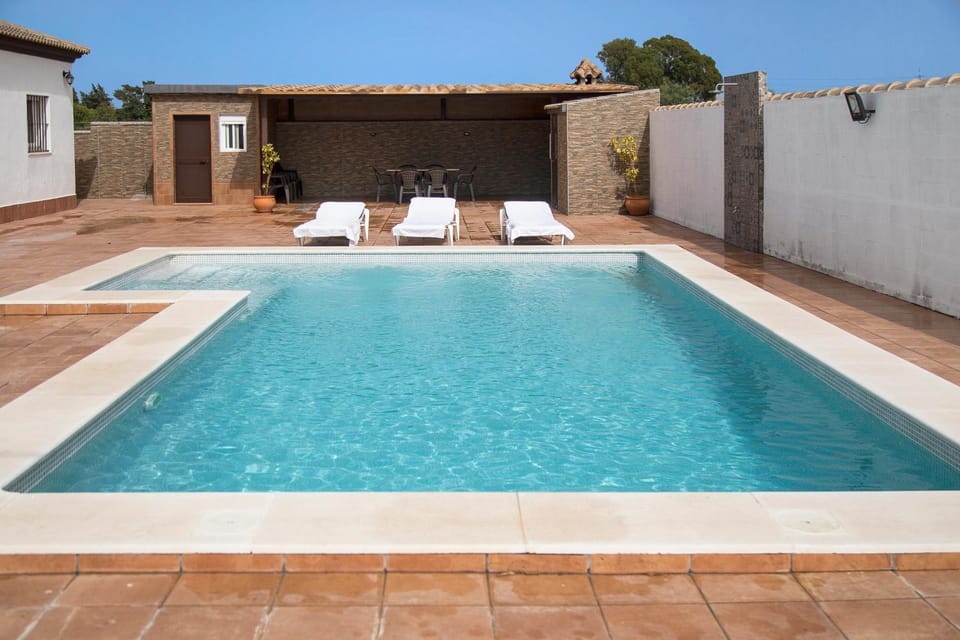 Property building, Living room, Swimming pool